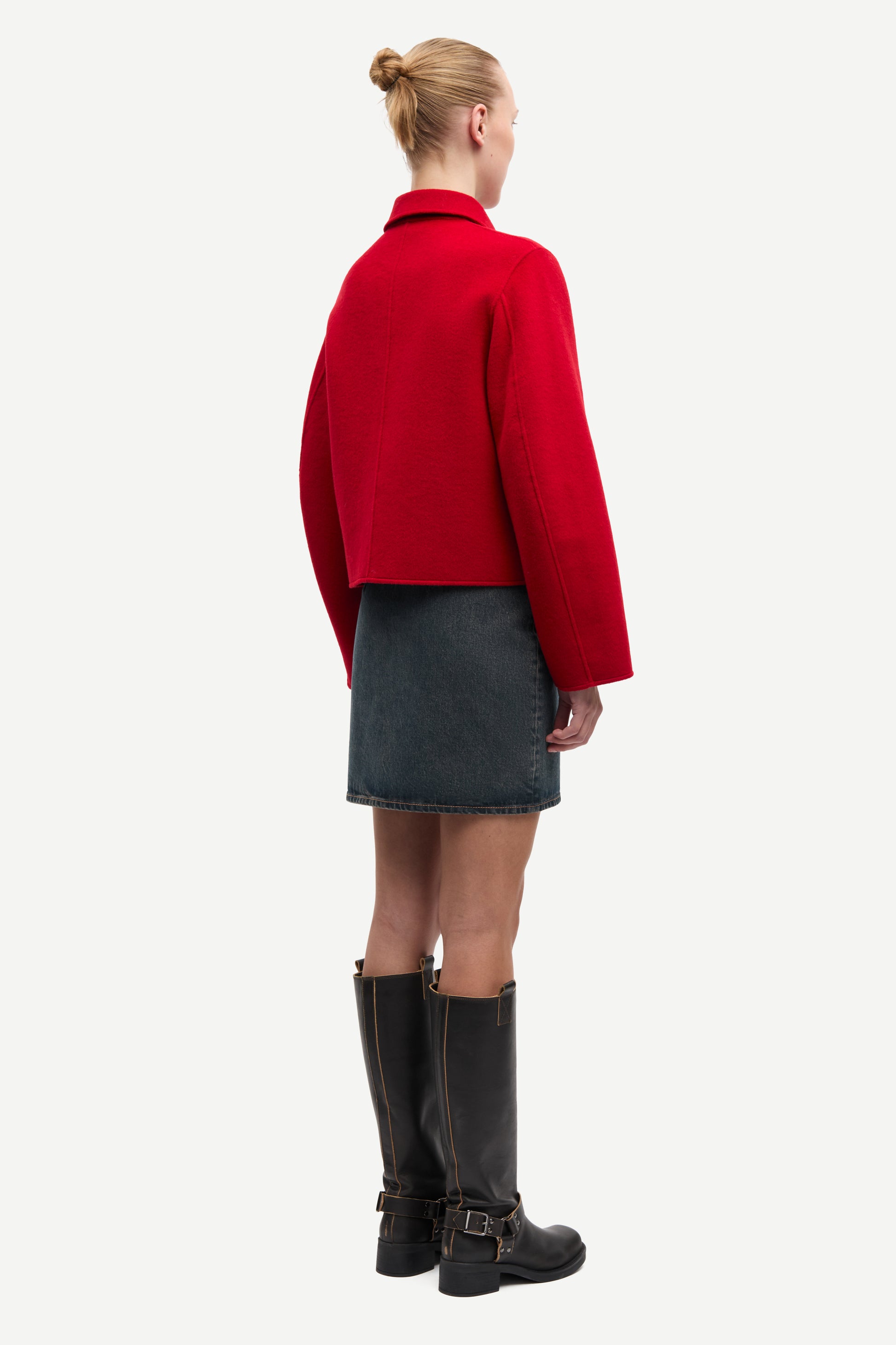 red boxy wool jacket with classic collar, black buttons and slightly cropped fit rear view 