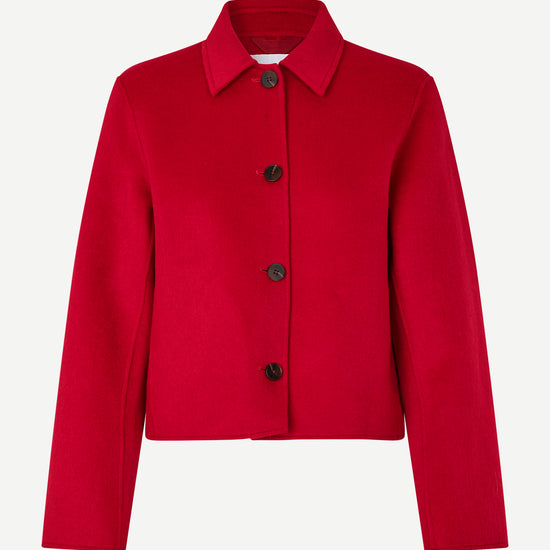 red boxy wool jacket with classic collar, black buttons and slightly cropped fit