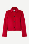 red boxy wool jacket with classic collar, black buttons and slightly cropped fit