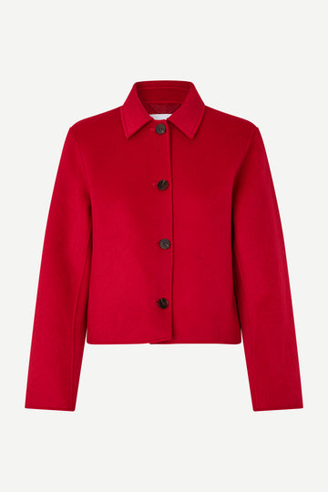 red boxy wool jacket with classic collar, black buttons and slightly cropped fit