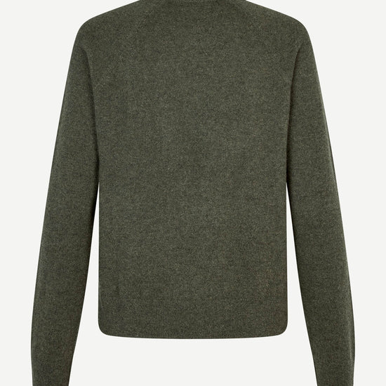 Dark green wool o neck jumper and rib detailing rear view