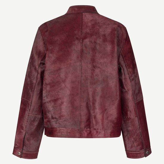 brown leather jacket with buckle at the neck and boxy fit rear view 