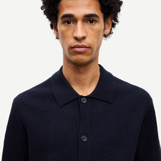 navy wool cardigan with classic collar  close up