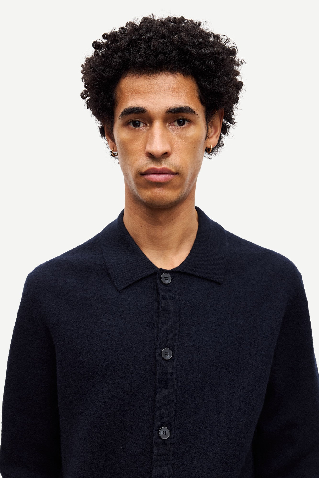 navy wool cardigan with classic collar  close up