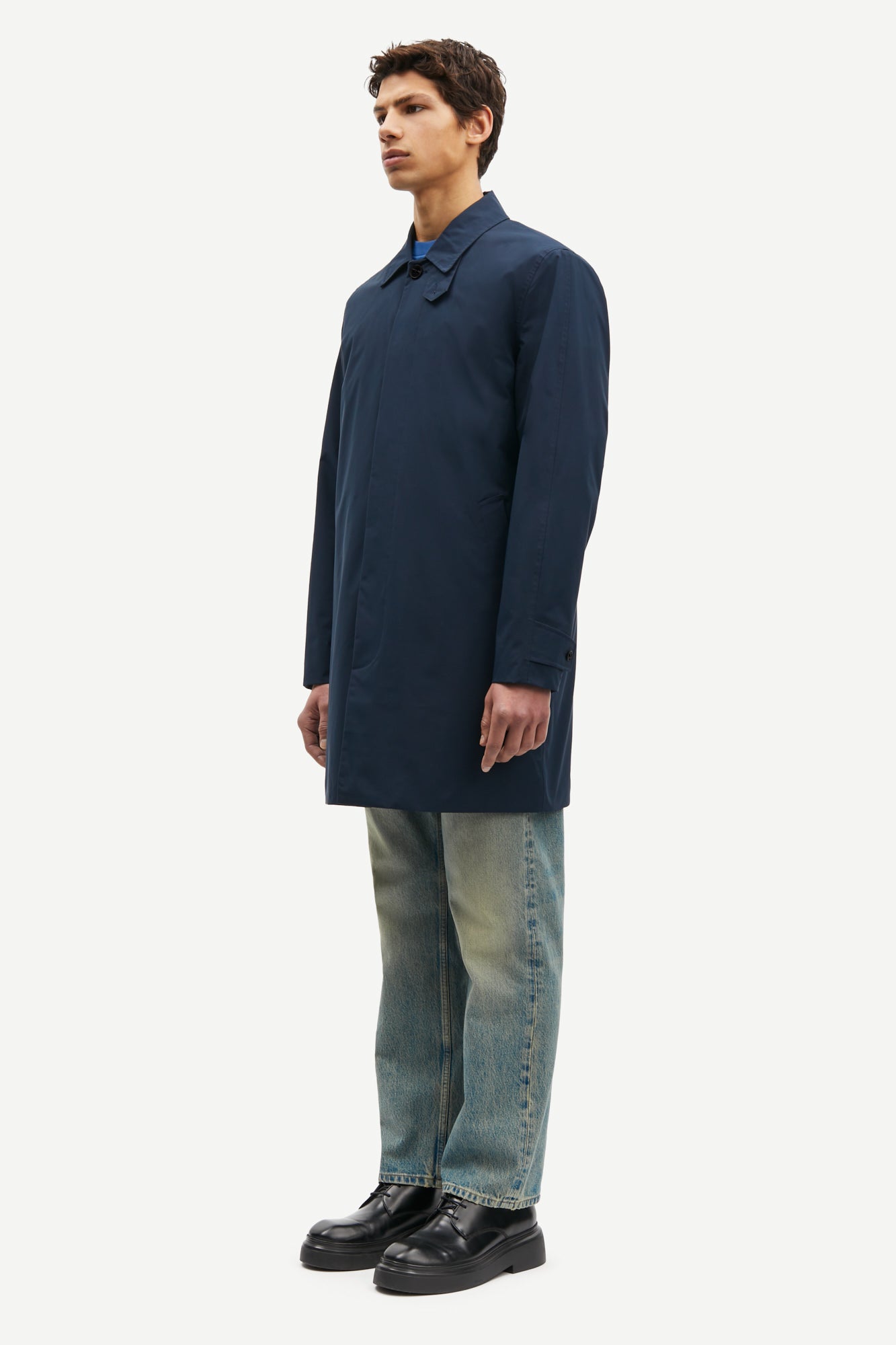 mens navy blue polyester longline coat with concealed placket side view 
