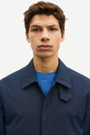 mens navy blue polyester longline coat with concealed placket close up