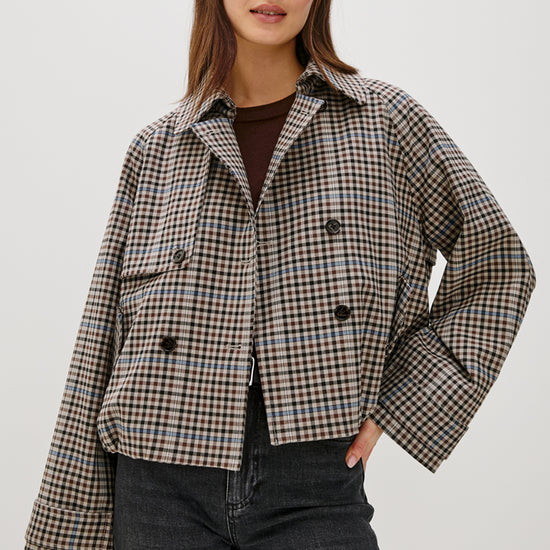 mocha check jacket with side pockets and double breasted front with wide sleeves model shot