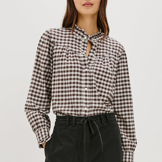 round neck top with chocolate brown check print and white buttons model shot