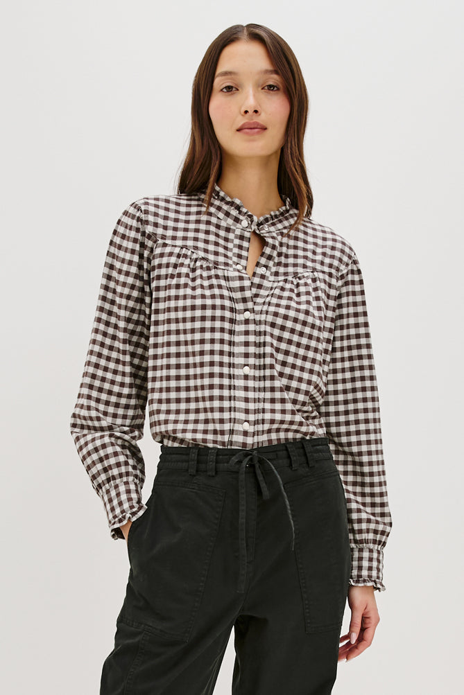 round neck top with chocolate brown check print and white buttons model shot