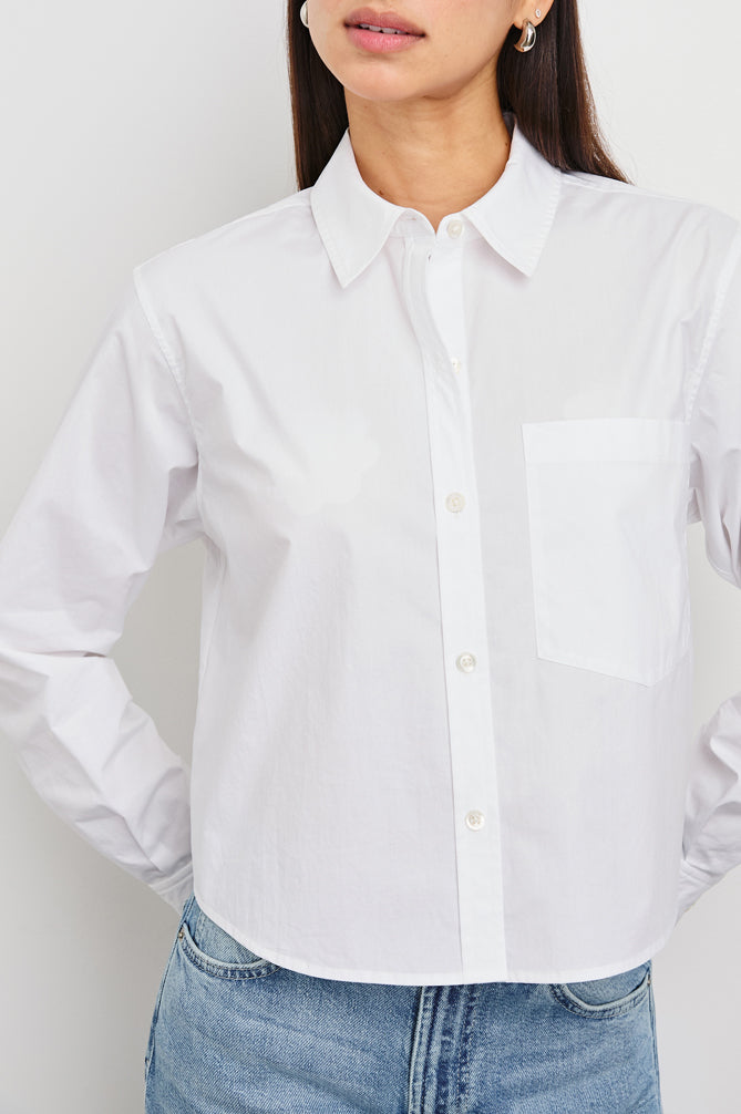 Classic white shirt with button down and regular fit  close up