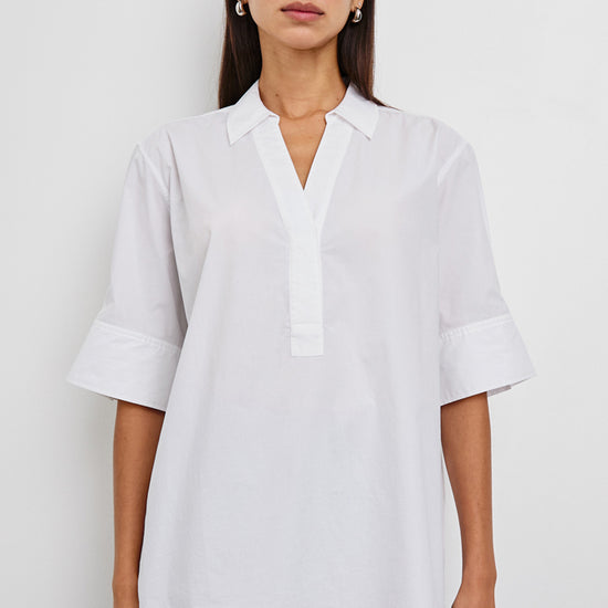 White short sleeve top with v neck, collar and boxy fit model shot