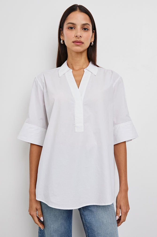 White short sleeve top with v neck, collar and boxy fit model shot