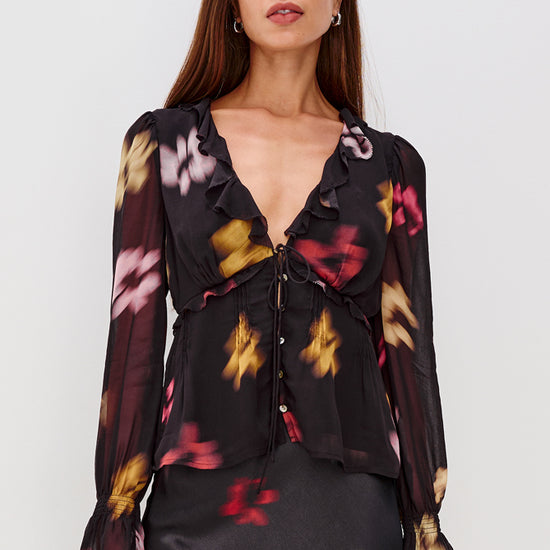 v neck long sleeve top with ruffle neck and viscose mix black floral print model shot