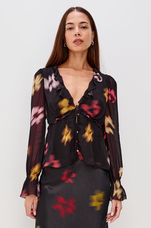 v neck long sleeve top with ruffle neck and viscose mix black floral print model shot