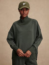 Olive green jumper with rib detailing and side zip model shot