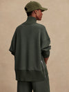 Olive green jumper with rib detailing and side zip rear view