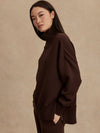 brown jumper with rib detailing and side zip side view from Varley