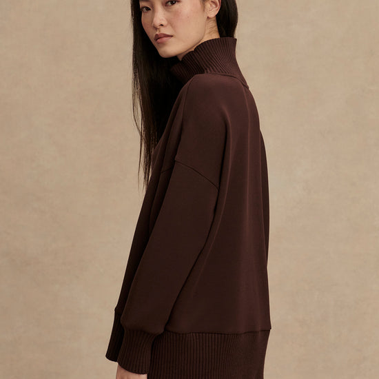 brown jumper with rib detailing and side zip side view from Varley