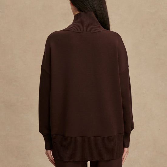 brown jumper with rib detailing and side zip rear view from Varley