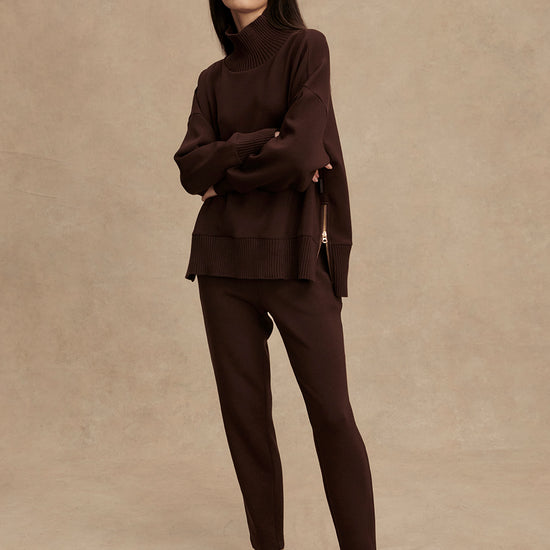 brown jumper with rib detailing and side zip model shot