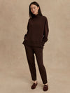 brown jumper with rib detailing and side zip model shot