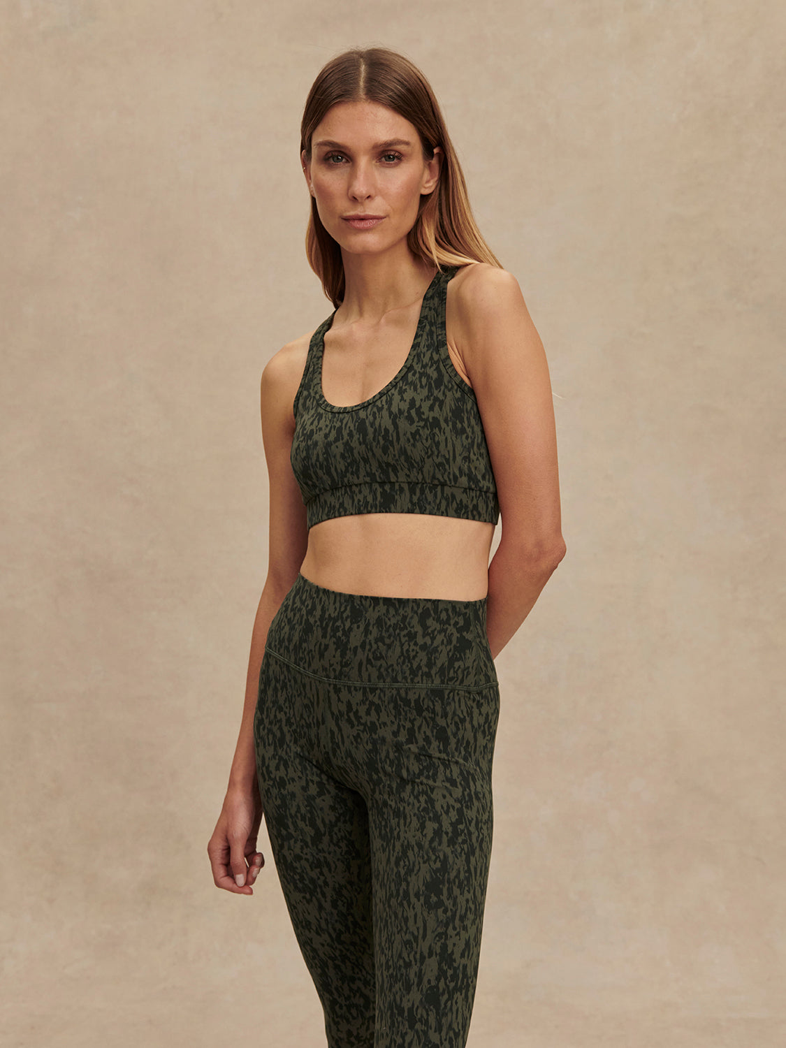 green pattern workout bra with racerback model shot