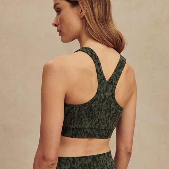 green pattern workout bra with racerback rear view 
