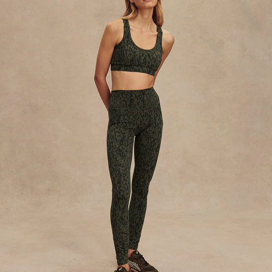 green pattern workout bra with racerback model shot