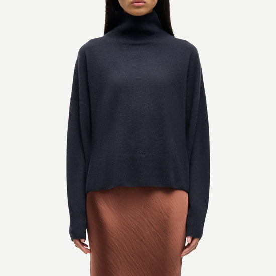 navy blue turtleneck cashmere jumper model shot