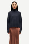 navy blue turtleneck cashmere jumper model shot