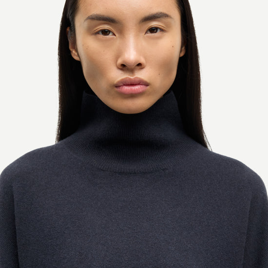 navy blue turtleneck cashmere jumper close up