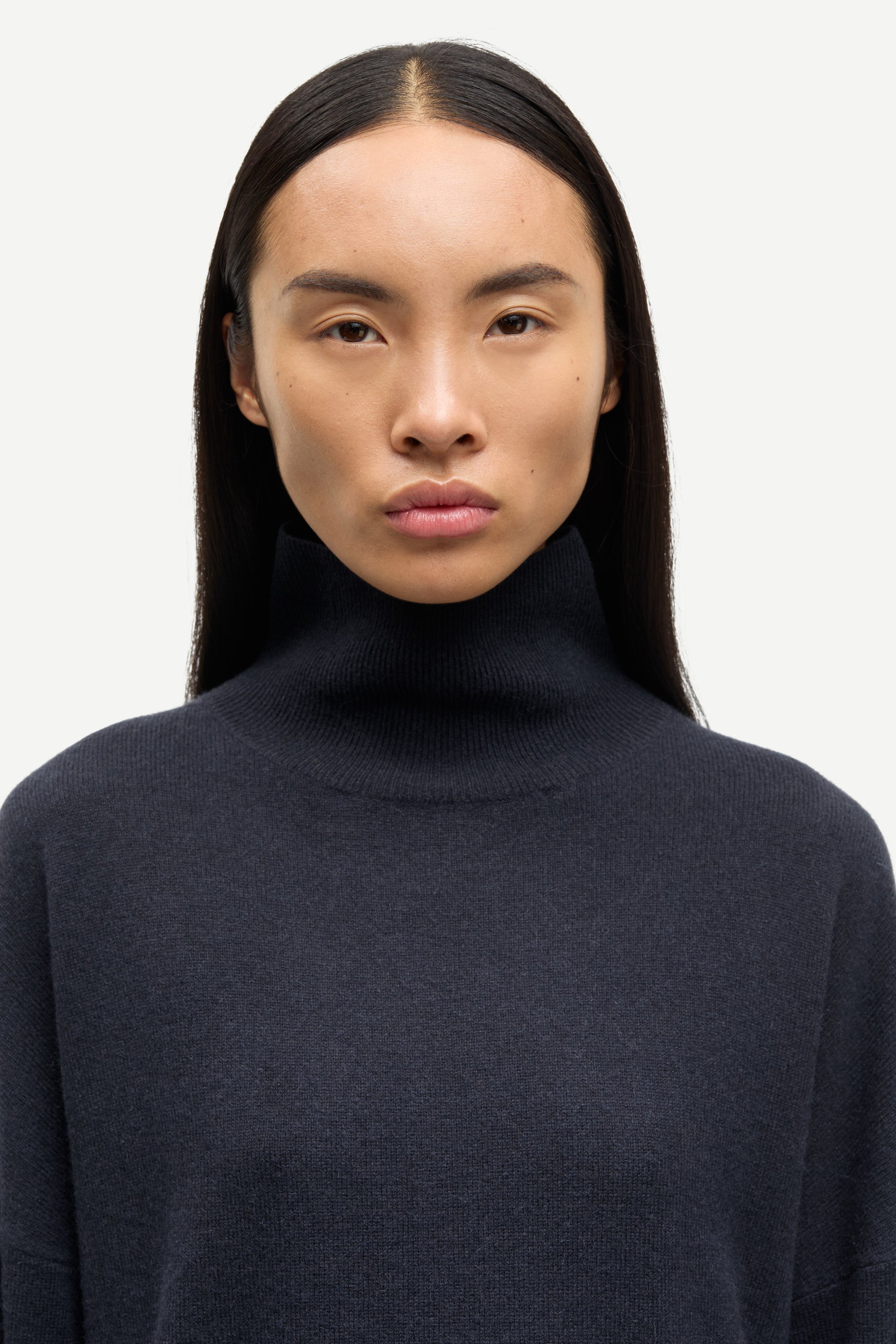 navy blue turtleneck cashmere jumper close up