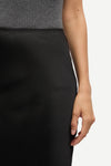 long satin black skirt with elasticated waistband and cut on the bias close up