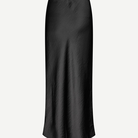 long satin black skirt with elasticated waistband and cut on the bias rear view