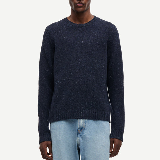 navy blue jumper with crew neck and rib detailing from samsoe samsoe model shot