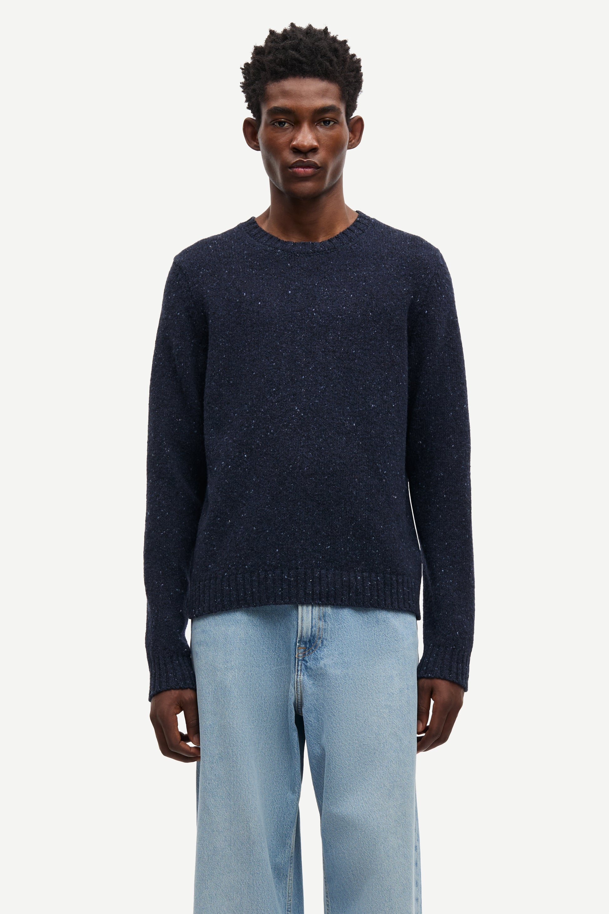 navy blue jumper with crew neck and rib detailing from samsoe samsoe model shot