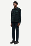 navy and green check overshirt with 2 chest patch pockets and buttoned cuffs from samsoe samsoe model shot