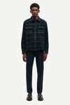 navy and green check overshirt with 2 chest patch pockets and buttoned cuffs from samsoe samsoe model shot