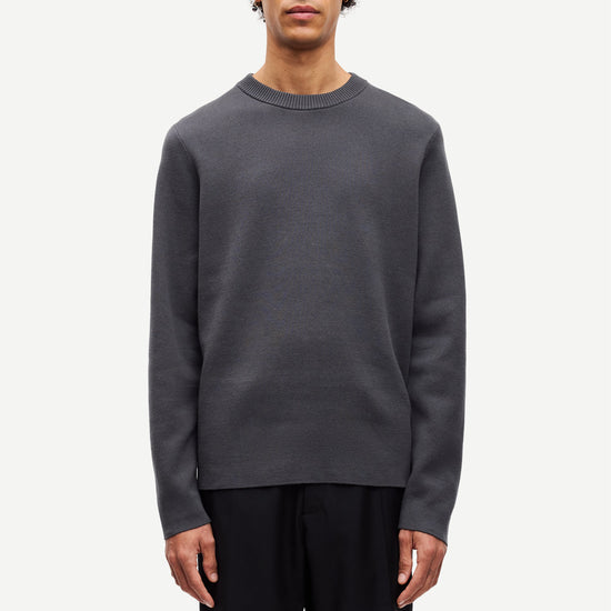 dark grey crew neck jumper from samsoe samsoe model shot