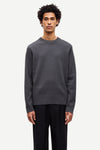 dark grey crew neck jumper from samsoe samsoe model shot