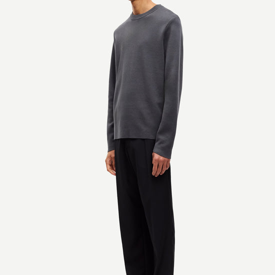 dark grey crew neck jumper from samsoe samsoe side view