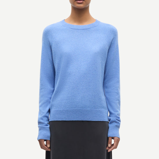 blue round neck jumper with ribbed neck, cuffs and hem from samsoe samsoe model shot