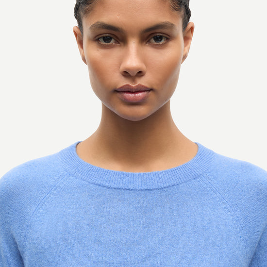 blue round neck jumper with ribbed neck, cuffs and hem from samsoe samsoe close up