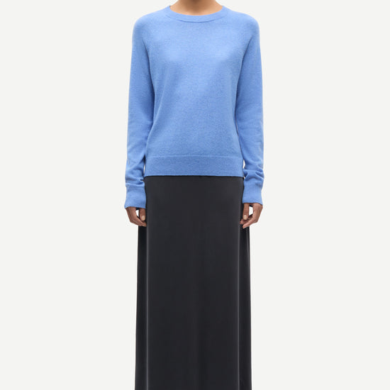 blue round neck jumper with ribbed neck, cuffs and hem from samsoe samsoe model shot