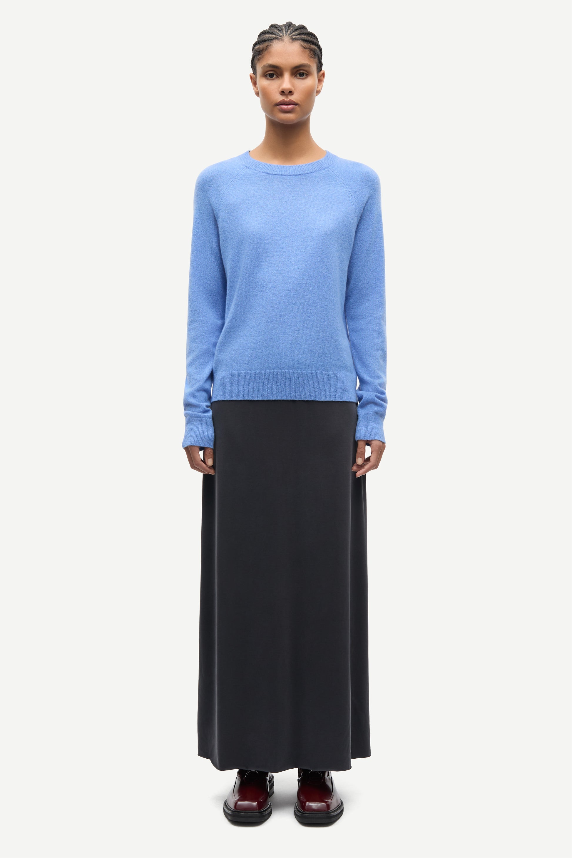 blue round neck jumper with ribbed neck, cuffs and hem from samsoe samsoe model shot