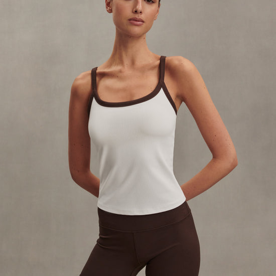 white ribbed tank top with chocolate brown straps/edging from varley