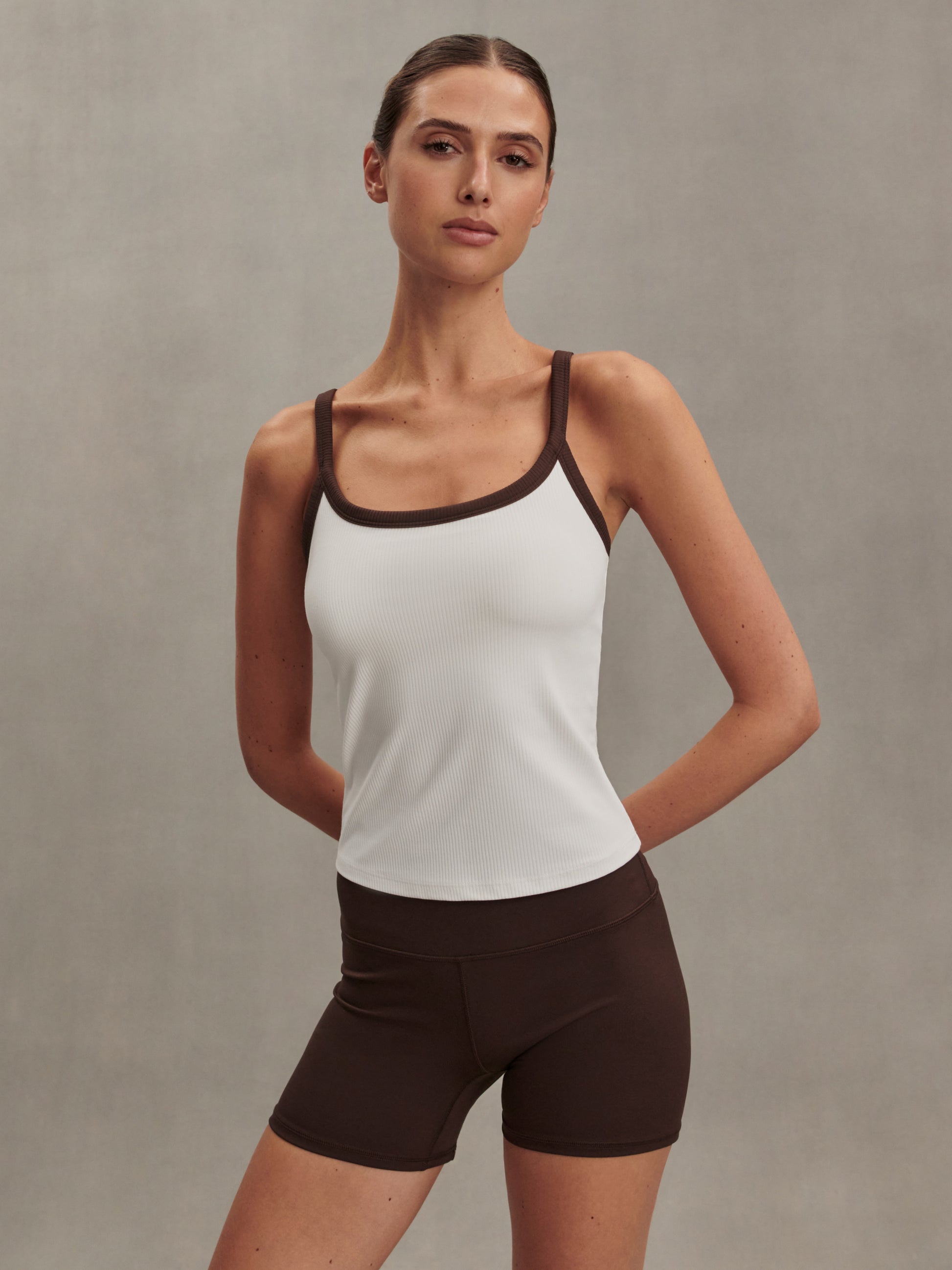 white ribbed tank top with chocolate brown straps/edging from varley