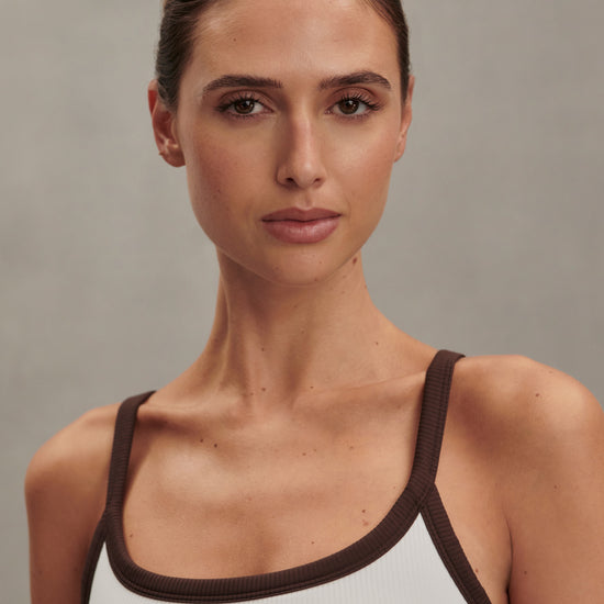 white ribbed tank top with chocolate brown straps/edging from varley close up