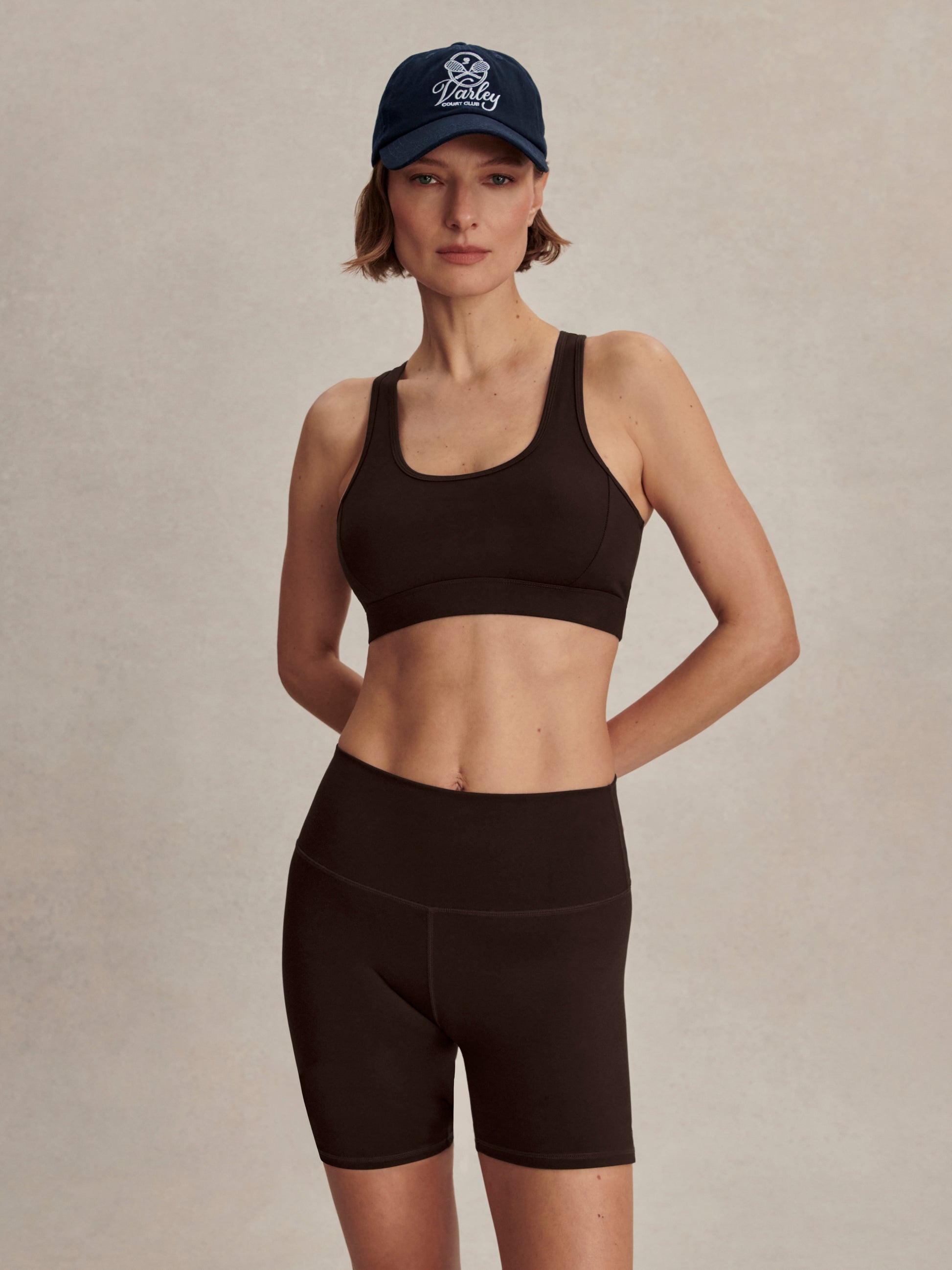 chocolate brown cycling shorts with high rise from varley model shot