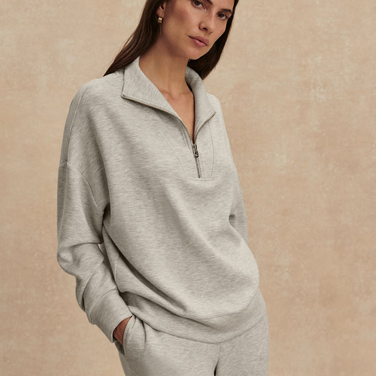 light grey marl half zip sweatshirt from varley model shot